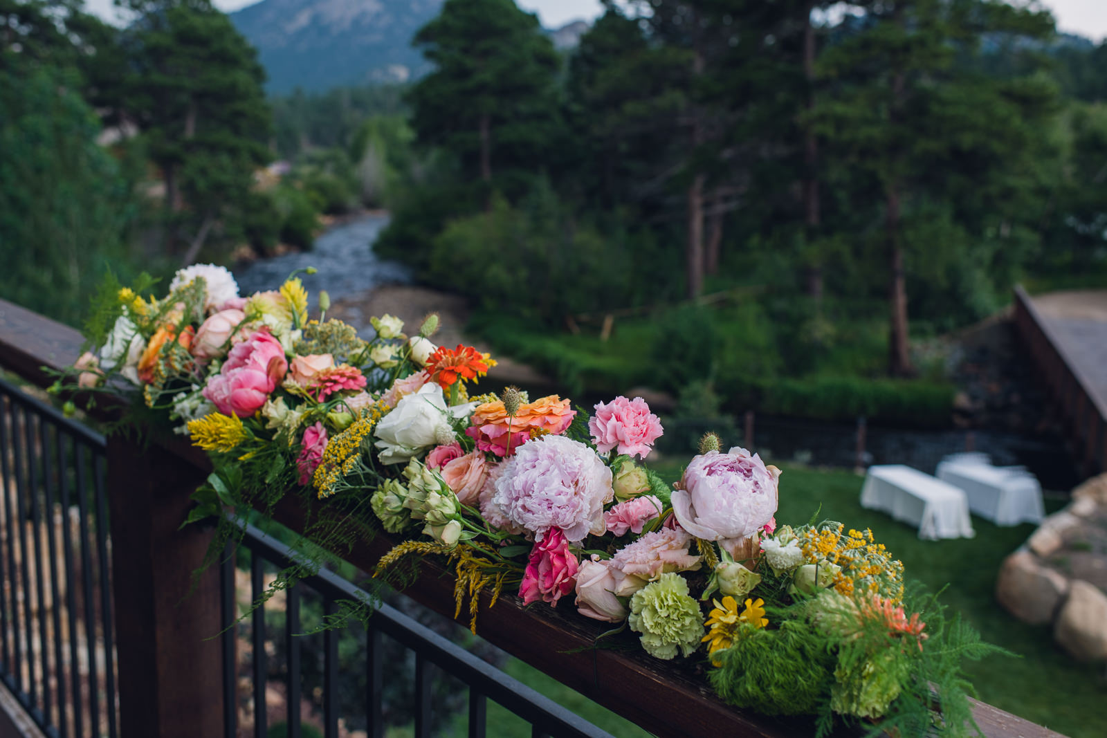 citrus wedding flowers at the landings estes park colorado